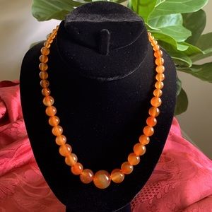 Amber graduating beads necklace. 18” long with 2” adjuster